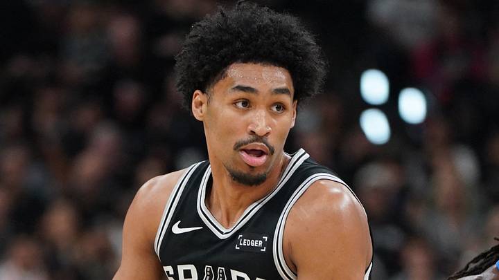 May 28, 2026; San Antonio, Texas, USA; San Antonio Spurs guard Dylan Harper (2) dribbles the ball past Oklahoma City Thunder guard Cason Wallace (22) in the first half during game six of the western conference finals for the 2026 NBA playoffs at Frost Bank Center. Mandatory Credit: Dustin Safranek-Imagn Images