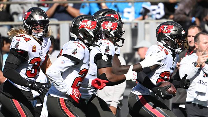 Tampa Bay Buccaneers safety Tykee Smith (23) runs after an interception against the Carolina Panthers Tampa Bay Buccaneers safety Tykee Smith (23) runs after an interception against the Carolina Panthers