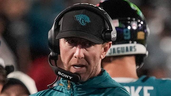 Jacksonville Jaguars head coach Liam Coen talks on his head set Jacksonville Jaguars head coach Liam Coen talks on his head set
