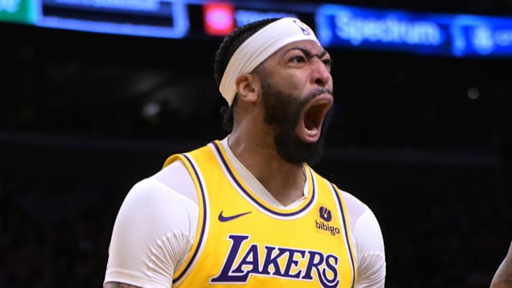Dec 28, 2023; Los Angeles, California, USA; Los Angeles Lakers forward Anthony Davis (3) reacts after a dunk over Charlotte Hornets center Nick Richards (4) in the first half at Crypto.com Arena. Mandatory Credit: Jayne Kamin-Oncea-Imagn Images Dec 28, 2023; Los Angeles, California, USA; Los Angeles Lakers forward Anthony Davis (3) reacts after a dunk over Charlotte Hornets center Nick Richards (4) in the first half at Crypto.com Arena. Mandatory Credit: Jayne Kamin-Oncea-Imagn Images