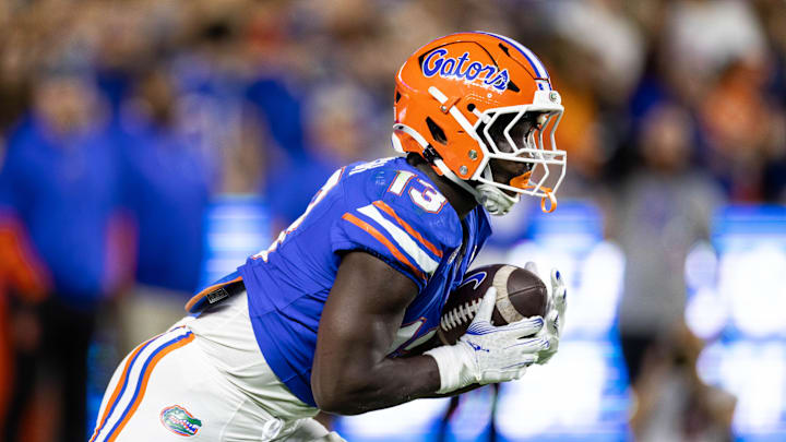 Oct 19, 2024; Gainesville, Florida, USA; Florida Gators running back Jadan Baugh (13) runs with the ball against the Kentucky Wildcats during the first half at Ben Hill Griffin Stadium. Mandatory Credit: Matt Pendleton-Imagn Images Oct 19, 2024; Gainesville, Florida, USA; Florida Gators running back Jadan Baugh (13) runs with the ball against the Kentucky Wildcats during the first half at Ben Hill Griffin Stadium. Mandatory Credit: Matt Pendleton-Imagn Images