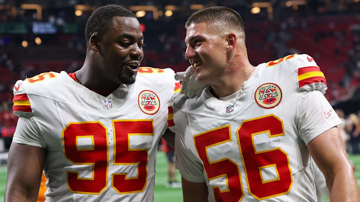 Sep 22, 2024; Atlanta, Georgia, USA; Kansas City Chiefs defensive tackle Chris Jones (95) and defensive end George Karlaftis (56) talk after a victory over the Atlanta Falcons at Mercedes-Benz Stadium. Mandatory Credit: Brett Davis-Imagn Images