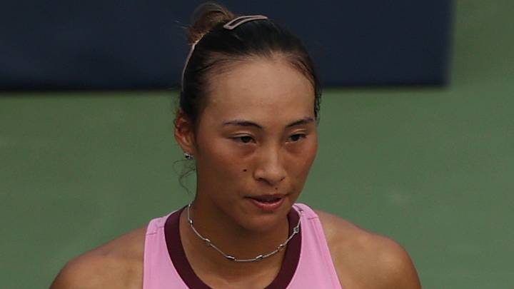 Zheng Qinwen reacts after winning a game Zheng Qinwen reacts after winning a game