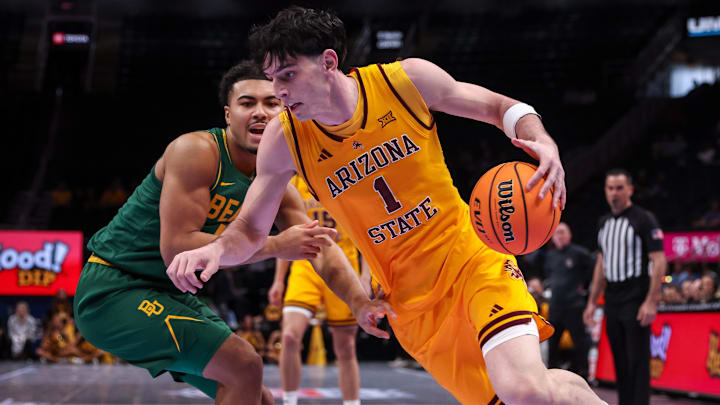 Mar 10, 2026; Kansas City, MO, USA; Arizona State Sun Devils forward Santiago Trouet (1) drives during the first half against the Baylor Bears at T-Mobile Center. Mandatory Credit: William Purnell-Imagn Images