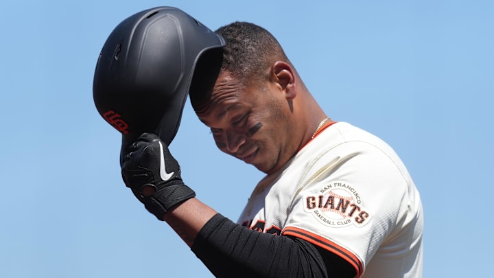 Jul 12, 2025; San Francisco, California, USA; San Francisco Giants designated hitter Rafael Devers (16) walks to the dugout after grounding out against the Los Angeles Dodgers during the sixth inning at Oracle Park. 