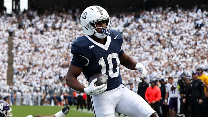 Oct 11, 2025; University Park, Pennsylvania, USA; Penn State Nittany Lions running back Nicholas Singleton (10) runs the ball into the end zone for a touchdown during the second quarter against the Northwestern Wildcats at Beaver Stadium. Mandatory Credit: Matthew O'Haren-Imagn Images