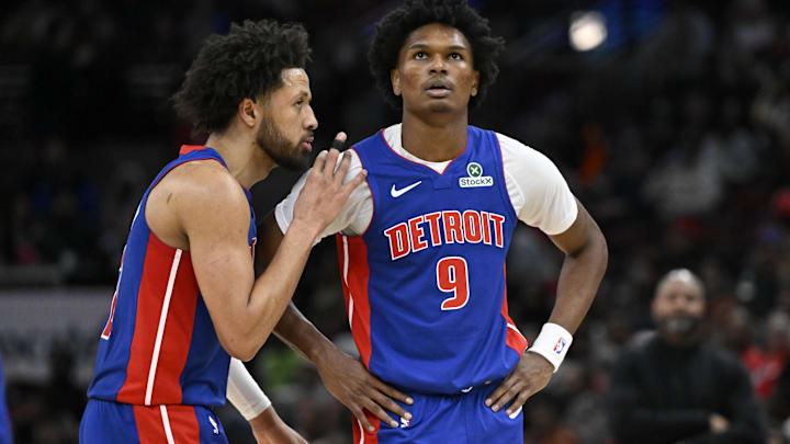 Detroit Pistons guard Cade Cunningham (2) and forward Ausar Thompson (9) chat against the Chicago Bulls during the second half at the United Center.