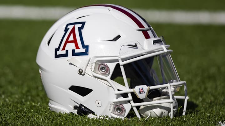 Nov 25, 2022; Tucson, Arizona, USA; Detailed view of an Arizona Wildcats helmet on the field during the Territorial Cup at Arizona Stadium. Mandatory Credit: Mark J. Rebilas-Imagn Images
