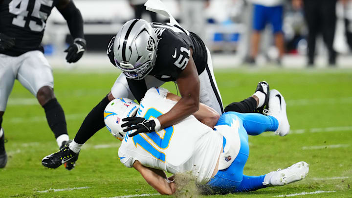 Las Vegas Raiders defensive end Malcolm Koonce sacks Los Angeles Chargers quarterback Justin Herbert 
