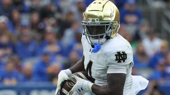 Notre Dame Fighting Irish running back Jeremiyah Love runs after a catch against the Pittsburgh Panthers.