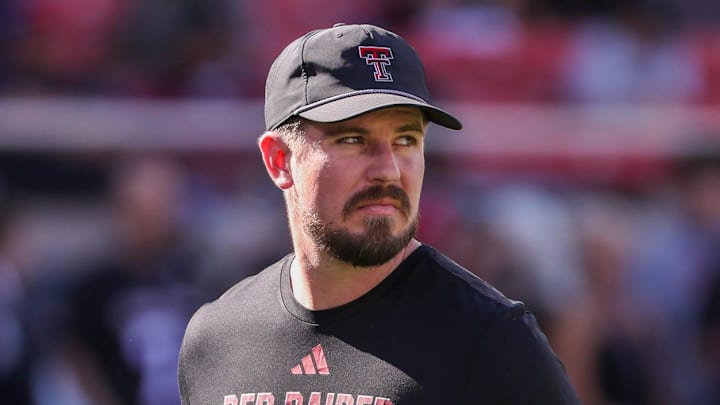 Texas Tech offensive coordinator Mack Leftwich looks on during warmups before a Big 12 Conference football game, Saturday, Nov. 15, 2025, at Jones AT&T Stadium.