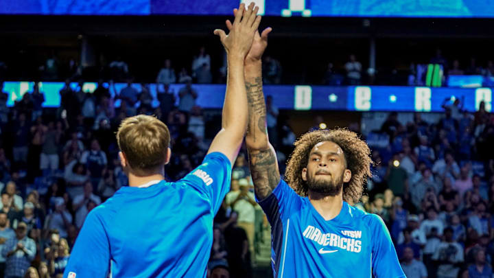 Oct 11, 2025; Dallas, Texas, USA; Dallas Mavericks forward Cooper Flagg (32) and center Dereck Lively II (2) high five prior to a game against the Charlotte Hornets at American Airlines Center. Mandatory Credit: Raymond Carlin III-Imagn Images Oct 11, 2025; Dallas, Texas, USA; Dallas Mavericks forward Cooper Flagg (32) and center Dereck Lively II (2) high five prior to a game against the Charlotte Hornets at American Airlines Center. Mandatory Credit: Raymond Carlin III-Imagn Images