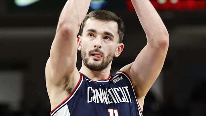 Dec 21, 2025; Chicago, Illinois, USA; UConn Huskies forward Alex Karaban (11) shoots a free throw against DePaul Blue Demons during the second half at Wintrust Arena. Mandatory Credit: Kamil Krzaczynski-Imagn Images Dec 21, 2025; Chicago, Illinois, USA; UConn Huskies forward Alex Karaban (11) shoots a free throw against DePaul Blue Demons during the second half at Wintrust Arena. Mandatory Credit: Kamil Krzaczynski-Imagn Images