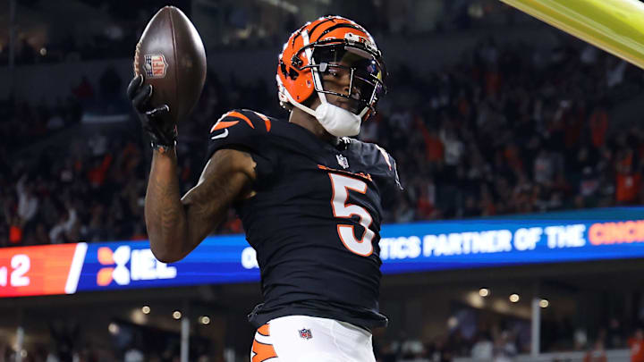 Dec 28, 2024; Cincinnati, Ohio, USA; Cincinnati Bengals wide receiver Tee Higgins (5) celebrates after making a touchdown pass reception against the Denver Broncos during the second quarter at Paycor Stadium. Mandatory Credit: Joseph Maiorana-Imagn Images Dec 28, 2024; Cincinnati, Ohio, USA; Cincinnati Bengals wide receiver Tee Higgins (5) celebrates after making a touchdown pass reception against the Denver Broncos during the second quarter at Paycor Stadium. Mandatory Credit: Joseph Maiorana-Imagn Images
