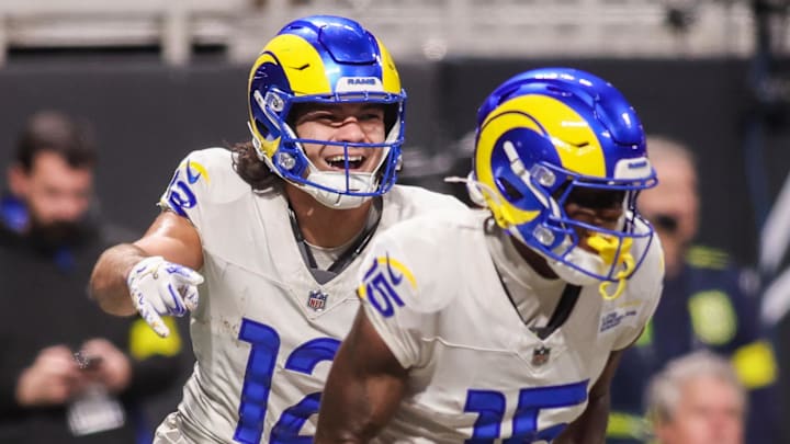 Dec 29, 2025; Atlanta, Georgia, USA; Los Angeles Rams wide receiver Puka Nacua (12) celebrates with wide receiver Konata Mumpfield (15) after a touchdown against the Atlanta Falcons in the fourth quarter at Mercedes-Benz Stadium. Mandatory Credit: Brett Davis-Imagn Images