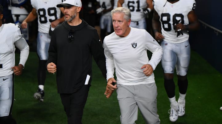 Aug 7, 2025; Seattle, Washington, USA; Las Vegas Raiders head coach Pete Carroll runs out of the tunnel before the second half against the Seattle Seahawks at Lumen Field. Mandatory Credit: Steven Bisig-Imagn Images