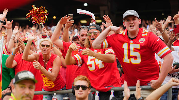 Sep 14, 2025; Kansas City, Missouri, USA; Kansas City Chiefs fans celebrate after a touchdown by Kansas City Chiefs quarterback Patrick Mahomes (15) against the Philadelphia Eagles during the second quarter of the game at GEHA Field at Arrowhead Stadium. Mandatory Credit: Jay Biggerstaff-Imagn Images