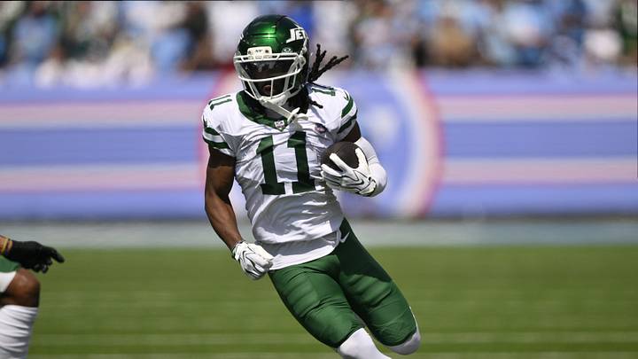 Sep 13, 2026; Nashville, Tennessee, USA; New York Jets wide receiver Omar Cooper Jr. (11) runs with the ball against the Tennessee Titans during the first quarter at Nissan Stadium. Mandatory Credit: Steve Roberts-Imagn Images Sep 13, 2026; Nashville, Tennessee, USA; New York Jets wide receiver Omar Cooper Jr. (11) runs with the ball against the Tennessee Titans during the first quarter at Nissan Stadium. Mandatory Credit: Steve Roberts-Imagn Images