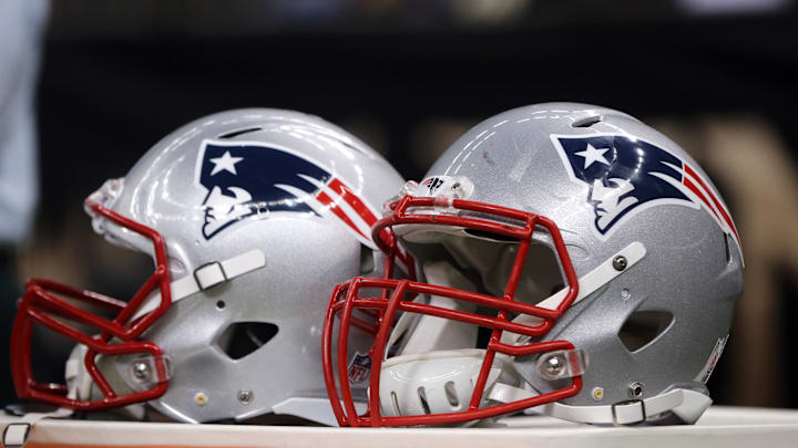 Aug 22, 2015; New Orleans, LA, USA; A pair of New England Patriots helmets on the bench in the second half of their game against the New Orleans Saints at Mercedes-Benz Superdome. The Patriots won, 26-24.Mandatory Credit: Chuck Cook-Imagn Images