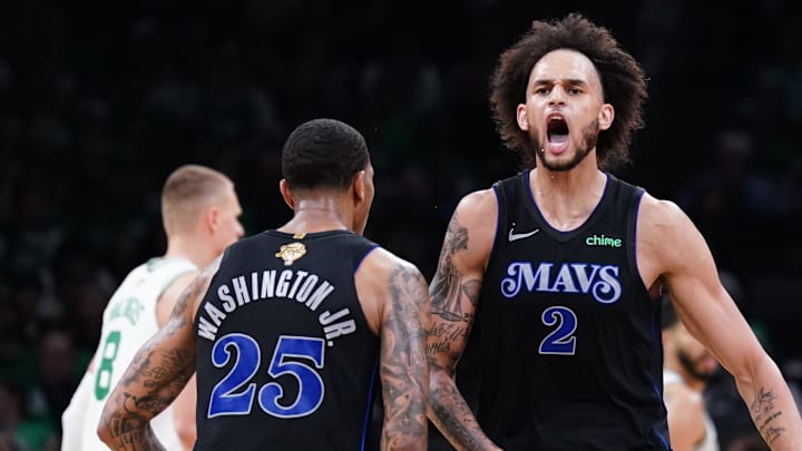 Jun 6, 2024; Boston, Massachusetts, USA; Dallas Mavericks center Dereck Lively II (2) and forward P.J. Washington (25) react in the third quarter against the Boston Celtics during game one of the 2024 NBA Finals at TD Garden. Mandatory Credit: David Butler II-Imagn Images