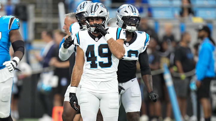 Aug 2, 2025; Charlottle, NC, USA; Carolina Panthers linebacker Jon Rhattigan (49) during Fanfest at Bank of America Stadium. Mandatory Credit: Jim Dedmon-Imagn Images Aug 2, 2025; Charlottle, NC, USA; Carolina Panthers linebacker Jon Rhattigan (49) during Fanfest at Bank of America Stadium. Mandatory Credit: Jim Dedmon-Imagn Images