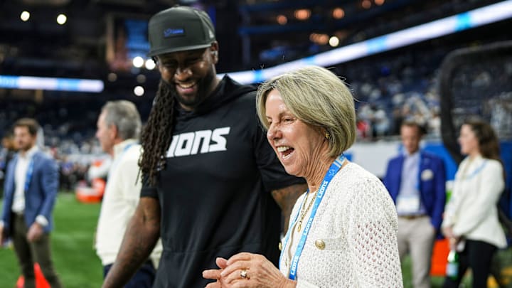 Detroit Lions Principal Owner and Chair Shield Ford Hamp talks to defensive coordinator Kelvin Sheppard during warmup at Ford Field in Detroit on Thursday, Dec. 4, 2025.