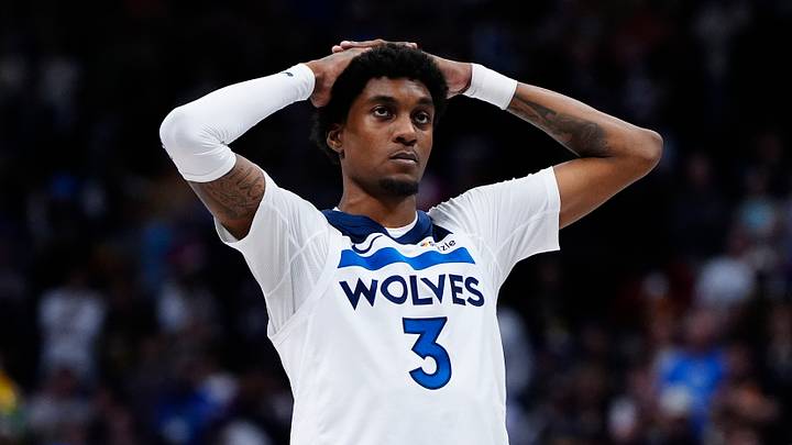 Dec 25, 2025; Denver, Colorado, USA; Minnesota Timberwolves forward Jaden McDaniels (3) reacts to a flagrant foul called in overtime against the Denver Nuggets at Ball Arena. Mandatory Credit: Ron Chenoy-Imagn Images