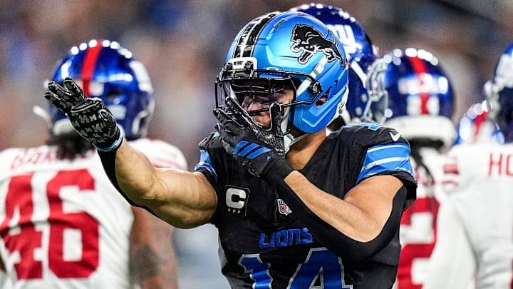 Detroit Lions wide receiver Amon-Ra St. Brown (14) celebrates a first down against New York Giants 