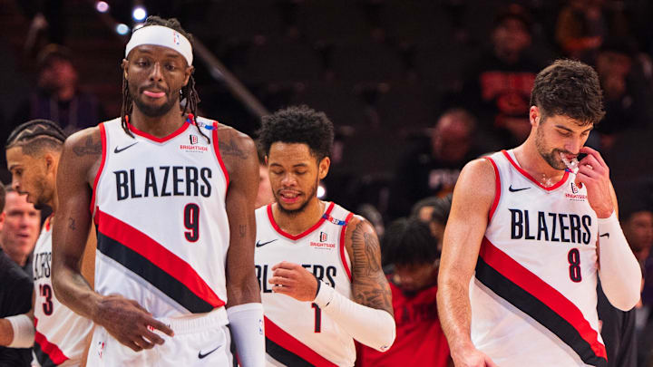 Dec 15, 2024; Phoenix, Arizona, USA; Portland Trail Blazers forward Jerami Grant (9), guard Anfernee Simons (1) and forward Deni Avdija (8) return to the court after a time out in the second half during a game against the Phoenix Suns at Footprint Center. Mandatory Credit: Allan Henry-Imagn Images