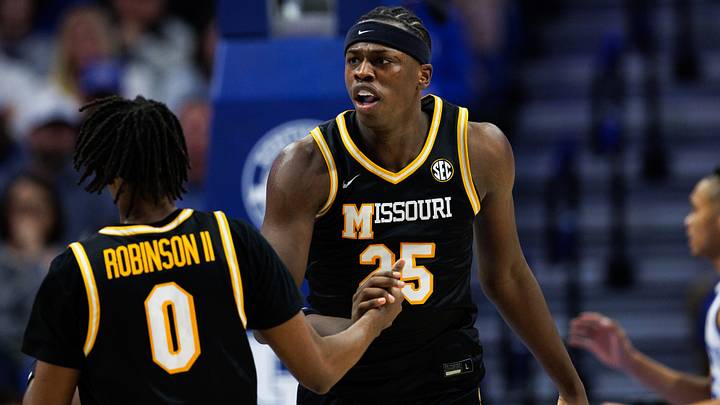 Jan 7, 2026; Lexington, Kentucky, USA; Missouri Tigers forward Mark Mitchell (25) celebrates with guard Anthony Robinson II (0) during the second half against the Kentucky Wildcats at Rupp Arena at Central Bank Center. Mandatory Credit: Jordan Prather-Imagn Images