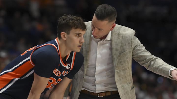 Mar 12, 2026; Nashville, TN, USA; Auburn Tigers head coach Steven Pearl talks with forward Filip Jovic (38) against the Tennessee Volunteers during the first half at Bridgestone Arena. Mandatory Credit: Steve Roberts-Imagn Images Mar 12, 2026; Nashville, TN, USA; Auburn Tigers head coach Steven Pearl talks with forward Filip Jovic (38) against the Tennessee Volunteers during the first half at Bridgestone Arena. Mandatory Credit: Steve Roberts-Imagn Images