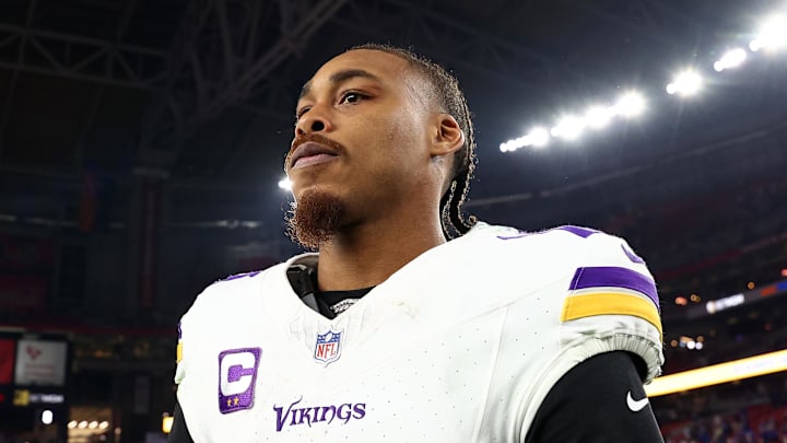 Vikings wide receiver Justin Jefferson walks off the field after a game.