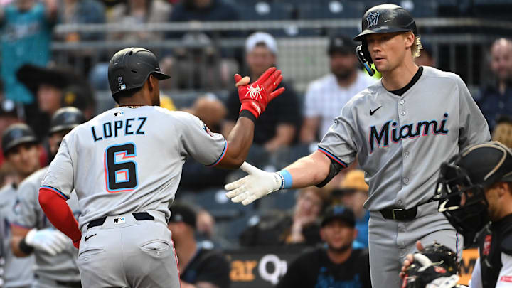 Jun 9, 2025; Pittsburgh, Pennsylvania, USA; Miami Marlins shortstop Otto Lopez (6) celebrates a home run with Kyle Stowers near Pittsburgh Pirates catcher Brett Sullivan during the second inning at PNC Park. Mandatory Credit: Philip G. Pavely-Imagn Images Jun 9, 2025; Pittsburgh, Pennsylvania, USA; Miami Marlins shortstop Otto Lopez (6) celebrates a home run with Kyle Stowers near Pittsburgh Pirates catcher Brett Sullivan during the second inning at PNC Park. Mandatory Credit: Philip G. Pavely-Imagn Images