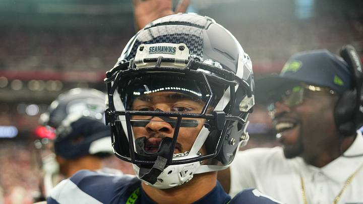 Seattle Seahawks wide receiver Jaxon Smith-Njigba reacts on the sideline
