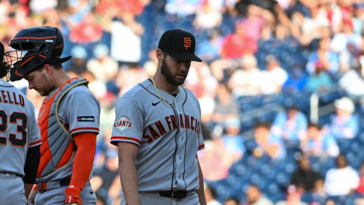 Apr 18, 2026; Washington, District of Columbia, USA; San Francisco Giants pitcher Adrian Houser (12) is removed from the game by manager Tony Vitello (23) at Nationals Park. Mandatory Credit: Brad Mills-Imagn Images
