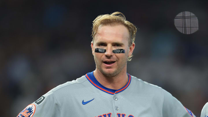 Sep 28, 2025; Miami, Florida, USA; New York Mets first baseman Pete Alonso (20) reacts while standing next to shortstop Francisco Lindor (12) after his at bat against the Miami Marlins during the fifth inning at loanDepot Park. Mandatory Credit: Sam Navarro-Imagn Images