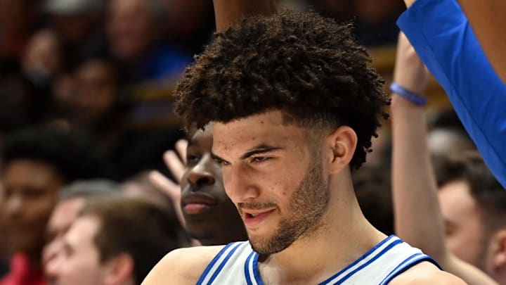 Feb 28, 2026; Durham, North Carolina, USA; Duke Blue Devils forward Cameron Boozer (12) reacts to a basket by his brother Cayden (not pictured) during the second half against the Virginia Cavaliers at Cameron Indoor Stadium. Duke won 77-51. Mandatory Credit: Rob Kinnan-Imagn Images Feb 28, 2026; Durham, North Carolina, USA; Duke Blue Devils forward Cameron Boozer (12) reacts to a basket by his brother Cayden (not pictured) during the second half against the Virginia Cavaliers at Cameron Indoor Stadium. Duke won 77-51. Mandatory Credit: Rob Kinnan-Imagn Images
