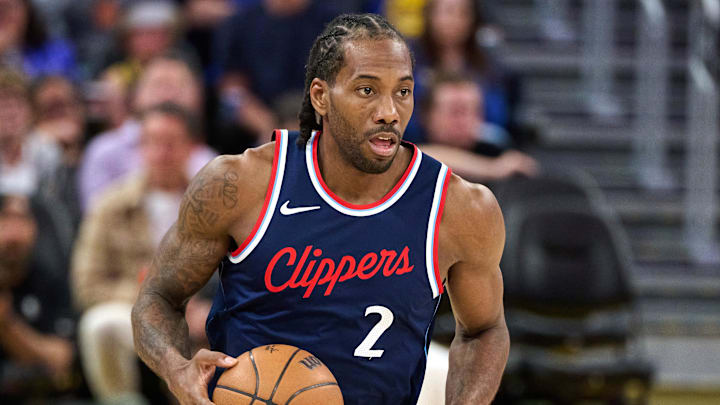 Apr 13, 2025; San Francisco, California, USA; LA Clippers forward Kawhi Leonard (2) brings the ball up court against the Golden State Warriors during the third quarter at Chase Center.