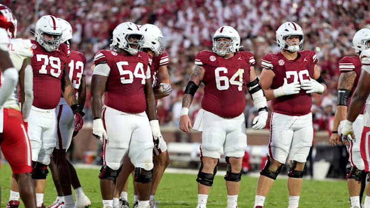 Oklahoma offensive linemen Jake Taylor, Febechi Nwaiwu, Joshua Bates and Jacob Sexton