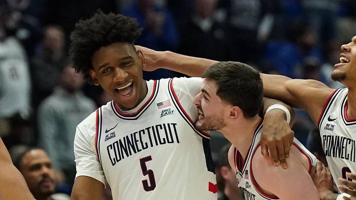 Jan 21, 2025; Storrs, Connecticut, USA; UConn Huskies center Tarris Reed Jr. (5) reacts with forward Alex Karaban (11) after scoring against the Butler Bulldogs in overtime at Harry A. Gampel Pavilion. Mandatory Credit: David Butler II-Imagn Images Jan 21, 2025; Storrs, Connecticut, USA; UConn Huskies center Tarris Reed Jr. (5) reacts with forward Alex Karaban (11) after scoring against the Butler Bulldogs in overtime at Harry A. Gampel Pavilion. Mandatory Credit: David Butler II-Imagn Images