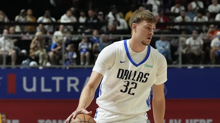 Jul 10, 2025; Las Vegas, NV, USA; Dallas Mavericks forward Cooper Flagg (32) dribbles against Los Angeles Lakers guard Bronny James (9) in the first quarter of their game at Thomas & Mack Center. Mandatory Credit: Candice Ward-Imagn Images