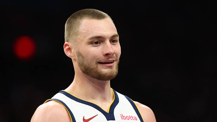 Mar 24, 2026; Phoenix, Arizona, USA; Denver Nuggets guard Christian Braun (0) against the Phoenix Suns at Mortgage Matchup Center. Mandatory Credit: Mark J. Rebilas-Imagn Images