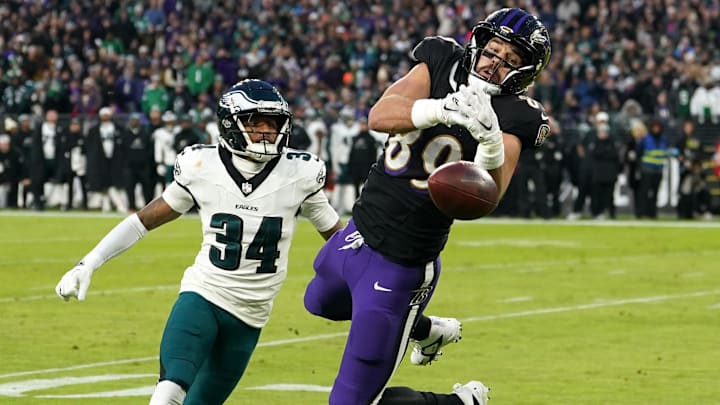 Dec 1, 2024; Baltimore, Maryland, USA; Baltimore Ravens tight end Mark Andrews (89) cannot make the first quarter catch defended by Philadelphia Eagles cornerback Isaiah Rodgers (34) at M&T Bank Stadium.