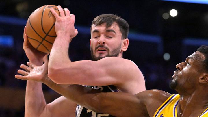 Oct 8, 2026; Los Angeles, California, USA;  Los Angeles Lakers guard Bronny James (9) defends Sacramento Kings center Dylan Cardwell (32) in the first half at Crypto.com Arena. Mandatory Credit: Jayne Kamin-Oncea-Imagn Images