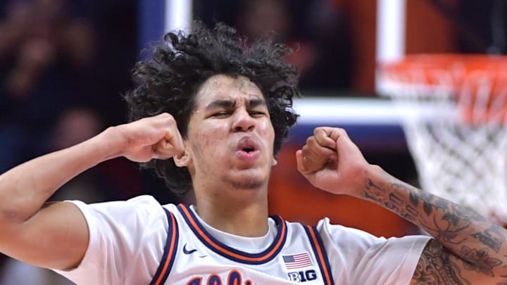 Dec 14, 2024; Champaign, Illinois, USA;  Illinois Fighting Illini forward Will Riley (7) reacts after being called for a foul during the first half against the Tennessee Volunteers at State Farm Center. Mandatory Credit: Ron Johnson-Imagn Images