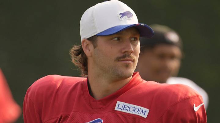 Buffalo Bills quarterback Josh Allen warms up with the other quarterbacks before practice begins at Bills Training Camp at St. John Fisher University in Pittsford on Aug.6, 2025.