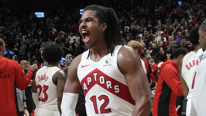 Dec 29, 2025; Toronto, Ontario, CAN; Toronto Raptors forward Collin Murray-Boyles (12) reacts after a win over the Orlando Magic at Scotiabank Arena. Mandatory Credit: John E. Sokolowski-Imagn Images