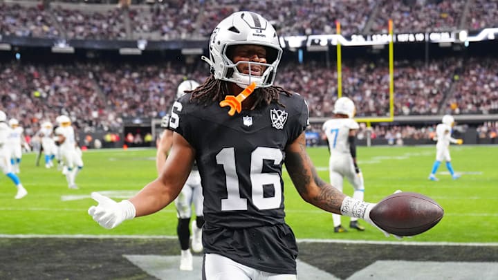Jan 5, 2025; Paradise, Nevada, USA; Las Vegas Raiders wide receiver Jakobi Meyers (16) celebrates after scoring a touchdown against the Los Angeles Chargers during the second quarter at Allegiant Stadium. Mandatory Credit: Stephen R. Sylvanie-Imagn Images