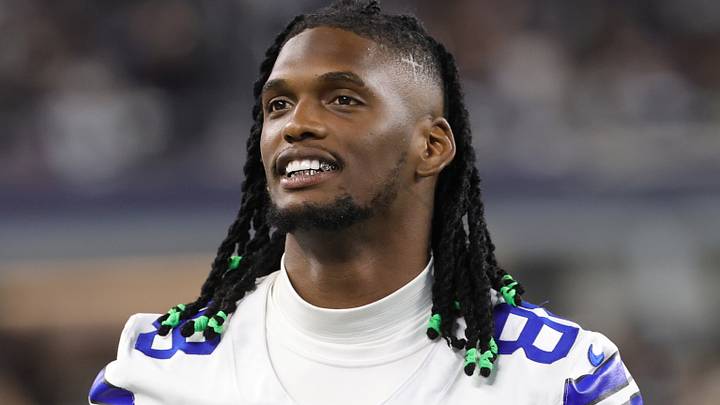 Dallas Cowboys wide receiver CeeDee Lamb looks on from the sidelines against the New Orleans Saints.