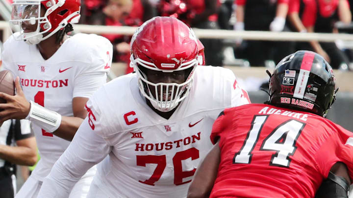 Sep 30, 2023; Lubbock, Texas, USA;  Houston Cougars offensive tackle Patrick Paul (76) blocks Texas